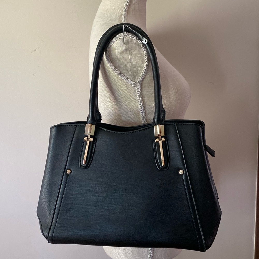 Vintage black PU woman’s tope hand bag with gold tone trim outside zip pocket